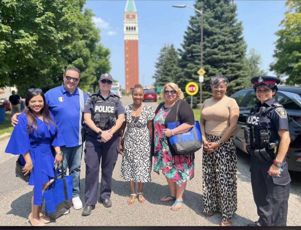 Nirmala Ramlall with neighbours and York Regional Police officers at a community event