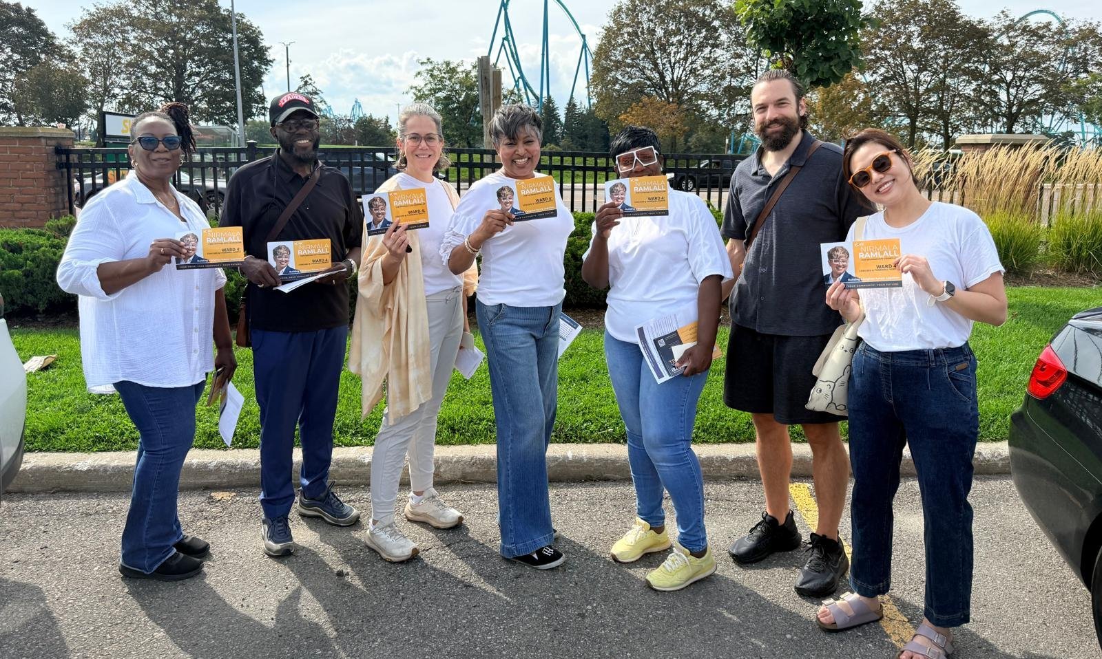 Nirmala Ramlall with campaign volunteers holding flyers in Ward 4