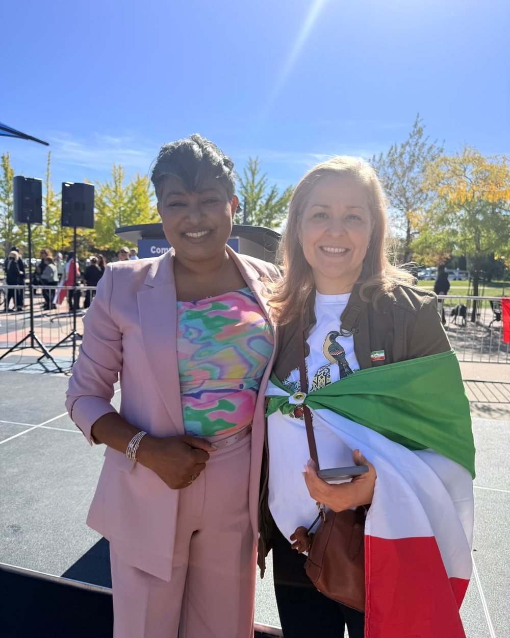 Nirmala Ramlall with a member of the Iranian-Canadian community at the unveiling ceremony
